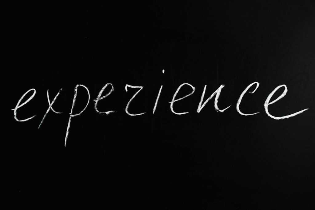 Chalkboard showing 'expezience', emphasizing creativity or error.